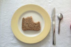 De overheid ziet werk als de remedie tegen armoede, de realiteit is anders